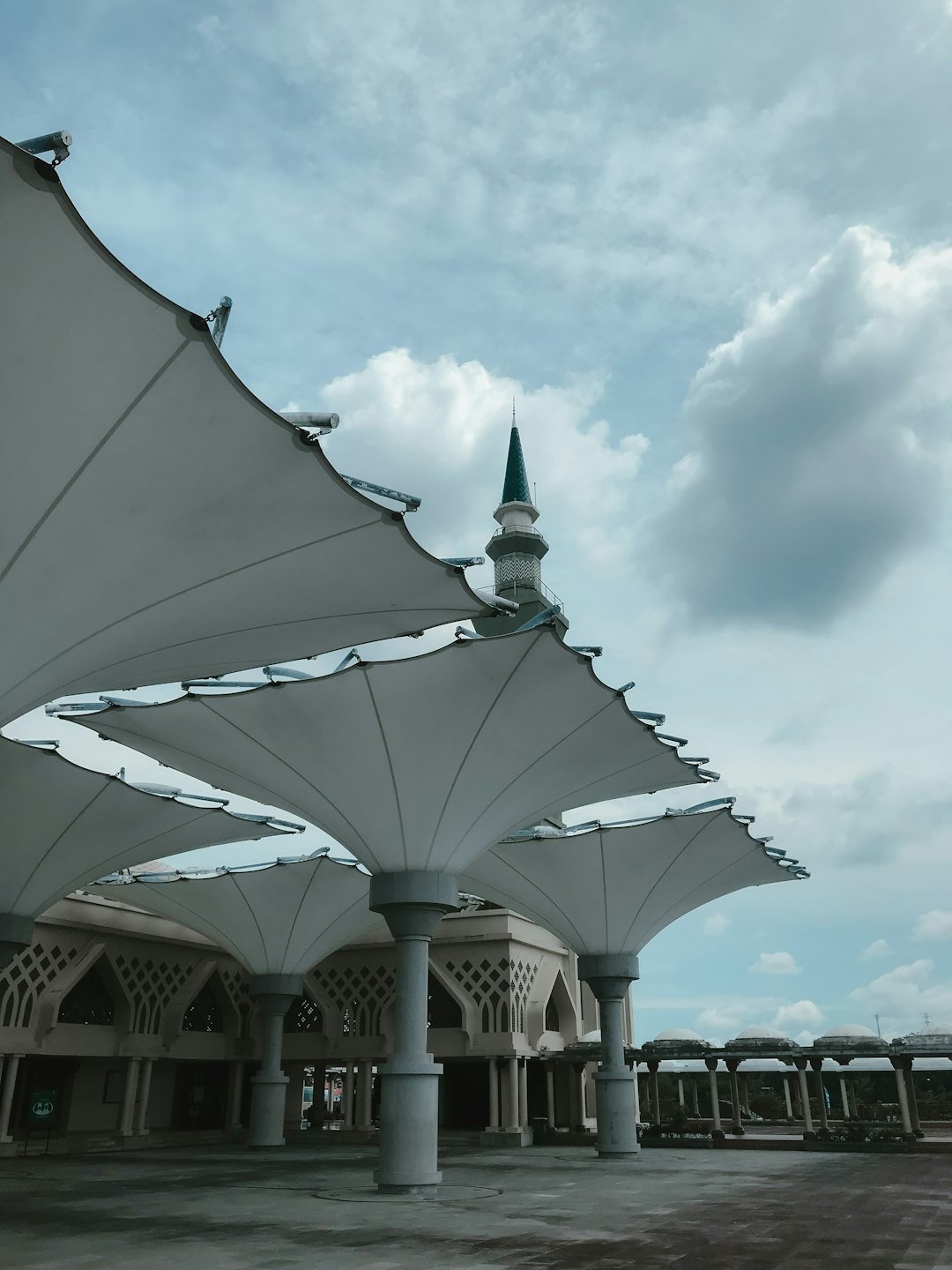 a large white structure with a clock tower on top of it y46qndgz86m.jpeg