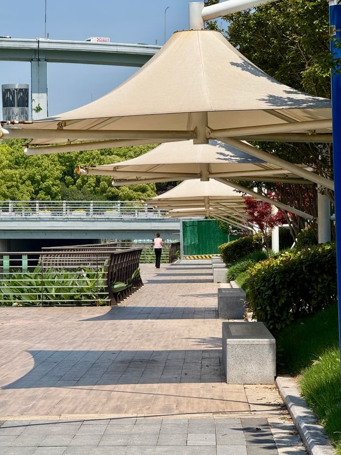 Sunny Day At Riverside Park With Unique Canopies 37370603